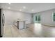 Spacious kitchen with stainless steel appliances, a breakfast bar, and a sliding door to the backyard at 3617 Scarlet Oak Dr, St Cloud, FL 34772