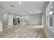 Open kitchen featuring stainless steel appliances, a breakfast bar, and ceramic tile flooring at 3617 Scarlet Oak Dr, St Cloud, FL 34772
