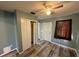 Inviting bedroom showcasing vinyl floors, a closet, and window, creating a cozy atmosphere at 3715 1/2 Avenue J Nw, Winter Haven, FL 33881