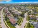 Aerial view of house, neighborhood, and distant lake at 4610 Salamander St, St Cloud, FL 34772