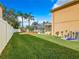 Landscaped backyard showcasing a spacious green lawn at 4610 Salamander St, St Cloud, FL 34772