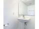 Clean bathroom with pedestal sink and shower/tub combo at 4610 Salamander St, St Cloud, FL 34772