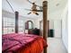 Spacious bedroom with a large four-poster bed and ample closet space at 4610 Salamander St, St Cloud, FL 34772