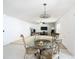 Bright dining area with glass table and four chairs at 4610 Salamander St, St Cloud, FL 34772
