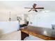 Bright office space with built-in desk and ceiling fan at 4610 Salamander St, St Cloud, FL 34772