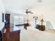 Home office with large desk and built-in shelving at 4610 Salamander St, St Cloud, FL 34772