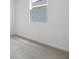 Bright bedroom features neutral carpet and window at 2007 Stetson Ave, Eagle Lake, FL 33839