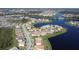 An attractive aerial view illustrating the home's lakeside location within a scenic neighborhood at 3960 Steer Beach Pl, Kissimmee, FL 34746