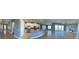 Spacious open concept layout with modern kitchen, island, and living area featuring water views at 3960 Steer Beach Pl, Kissimmee, FL 34746
