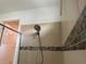 Updated shower with tile surround and multiple shower heads at 3960 Steer Beach Pl, Kissimmee, FL 34746
