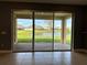 Gorgeous view of the lake from the covered patio with brick pavers at 3960 Steer Beach Pl, Kissimmee, FL 34746