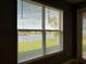 Serene water view seen through window with blinds, offering a peaceful ambiance at 3960 Steer Beach Pl, Kissimmee, FL 34746