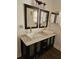 Bathroom with a double vanity, vessel sinks, and modern fixtures at 4758 Wyresdale St, Orlando, FL 32808
