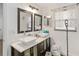 Bathroom featuring a double sink vanity, modern fixtures, and ample counter space at 4758 Wyresdale St, Orlando, FL 32808