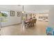 Open dining area with a table, chairs, and access to the kitchen for easy serving at 4758 Wyresdale St, Orlando, FL 32808