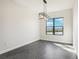 Empty dining room with large window and chandelier at 224 Valencia Ridge Dr, Auburndale, FL 33823