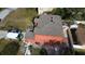 Aerial view of the home's roof, garage, patio, and driveway at 438 Spike Ct, Kissimmee, FL 34759