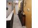 Upstairs hallway features decorative cabinets and wall decor at 438 Spike Ct, Kissimmee, FL 34759