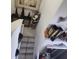 Stairway featuring tile steps, decorative trim, and unique wall decor throughout at 438 Spike Ct, Kissimmee, FL 34759