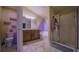 Bathroom with double vanity, bathtub and shower at 464 Bridgewater Ct, Kissimmee, FL 34758