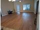 Spacious living room featuring hardwood floors and lots of natural light at 464 Bridgewater Ct, Kissimmee, FL 34758
