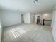 Large bonus room featuring new carpet and abundant natural light at 13193 Tollcross Way, Winter Garden, FL 34787