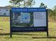 A community sign advertises 'Clubhouse Coming Soon', featuring a detailed site plan and contact information at 13193 Tollcross Way, Winter Garden, FL 34787