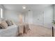Neutral-toned bedroom with carpeted flooring and an ensuite bathroom at 5249 Villa Rosa Ave, St Cloud, FL 34771