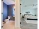 Inviting main bedroom with attached bathroom featuring modern fixtures and stylish decor at 5249 Villa Rosa Ave, St Cloud, FL 34771