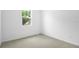Cozy carpeted bedroom with natural light at 1753 Carnelian St, Deland, FL 32720