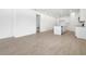 Spacious living room featuring tile flooring, open layout and natural light at 1753 Carnelian St, Deland, FL 32720
