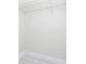 Small, walk-in closet with basic wire shelving and light-colored wood-look floors at 1415 Orlando Way, Kissimmee, FL 34759