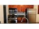 Modern kitchen with stainless steel appliances and wood cabinets at 2041 Dixie Belle Dr # 2041P, Orlando, FL 32812