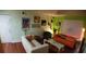 Spacious living room featuring two sofas and wood floors at 2041 Dixie Belle Dr # 2041P, Orlando, FL 32812