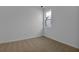 Bright bedroom with neutral carpet and a window offering natural light at 5410 Catmint Dr, Lake Hamilton, FL 33851