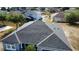 Aerial view of a well maintained home with a large, modern roof at 4523 Ashtubula Ct, Orlando, FL 32818