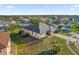 Aerial view of a home with mature landscaping and a well-maintained lawn at 4523 Ashtubula Ct, Orlando, FL 32818