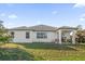 Spacious backyard with a covered patio at 4523 Ashtubula Ct, Orlando, FL 32818
