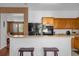 Well-equipped kitchen featuring ample cabinet space and black appliances at 4523 Ashtubula Ct, Orlando, FL 32818