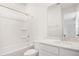 All white bathroom with tub and shower combination at 1769 Carnelian St, Deland, FL 32720