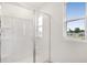 Bathroom shower with clear glass door and lots of light at 1769 Carnelian St, Deland, FL 32720