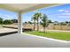 Covered patio with a view of landscaped lawn and neighborhood at 1771 Carnelian St, Deland, FL 32720