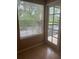 Sunroom with floor to ceiling windows at 1940 Lake Atriums Cir # 93, Orlando, FL 32839