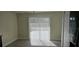 Dining area with sliding glass doors to backyard at 2118 Allspice Ave, Orlando, FL 32837
