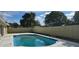 Inviting rectangular pool in a backyard with a wooden fence at 2118 Allspice Ave, Orlando, FL 32837