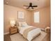 This inviting bedroom boasts natural light, a plush rug, and serene ambiance at 7845 Wandering Way, Orlando, FL 32836