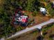 Aerial view of property and surrounding trees at 1808 S Tanner Rd, Orlando, FL 32820