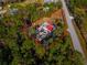 Aerial view of property with red metal roof at 1808 S Tanner Rd, Orlando, FL 32820