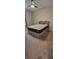 Comfortable bedroom with plush carpet, a comfortable bed, and soft window curtains for a relaxing ambiance at 3907 Golden Knot Dr, Kissimmee, FL 34746