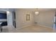 Bright dining room featuring a chandelier and tan tiled flooring at 3907 Golden Knot Dr, Kissimmee, FL 34746